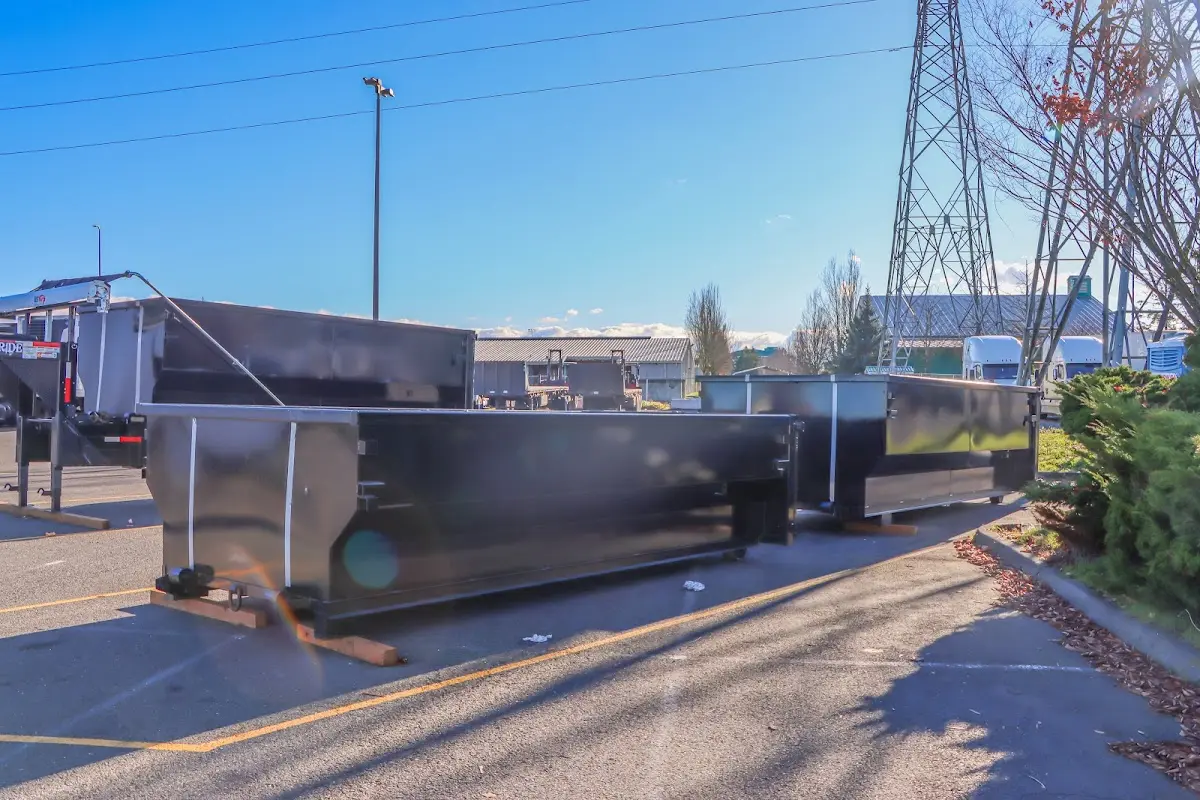 Roll-off dumpster ready for waste disposal at job site for Construction Dumpster Rental in Fairmont